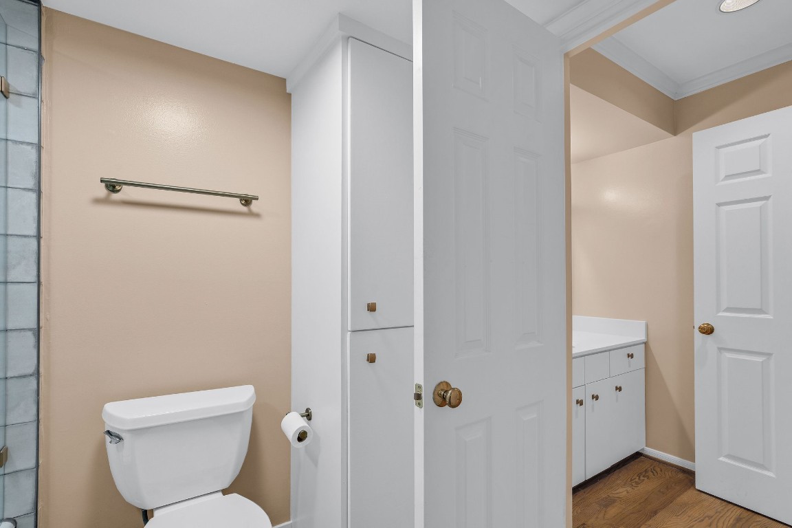 5084 Augusta Street Houston, TX 77007 - Photo 26 of 43 a bathroom with a toilet and a shower