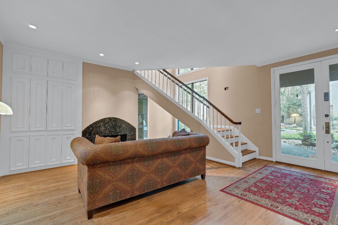5084 Augusta Street Houston, TX 77007 - Photo 7 of 43 a living room with furniture and wooden floor