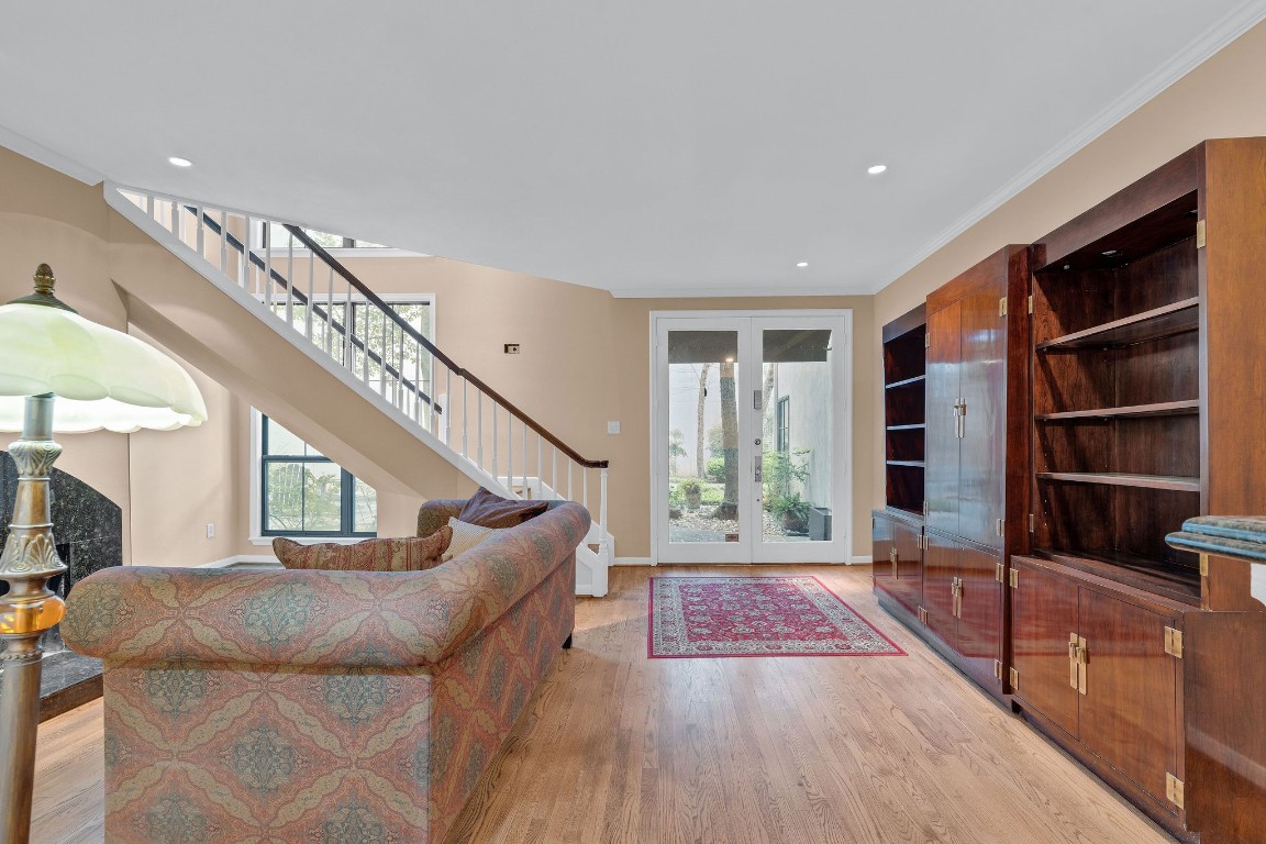 5084 Augusta Street Houston, TX 77007 - Photo 8 of 43 a living room with furniture and a floor to ceiling window
