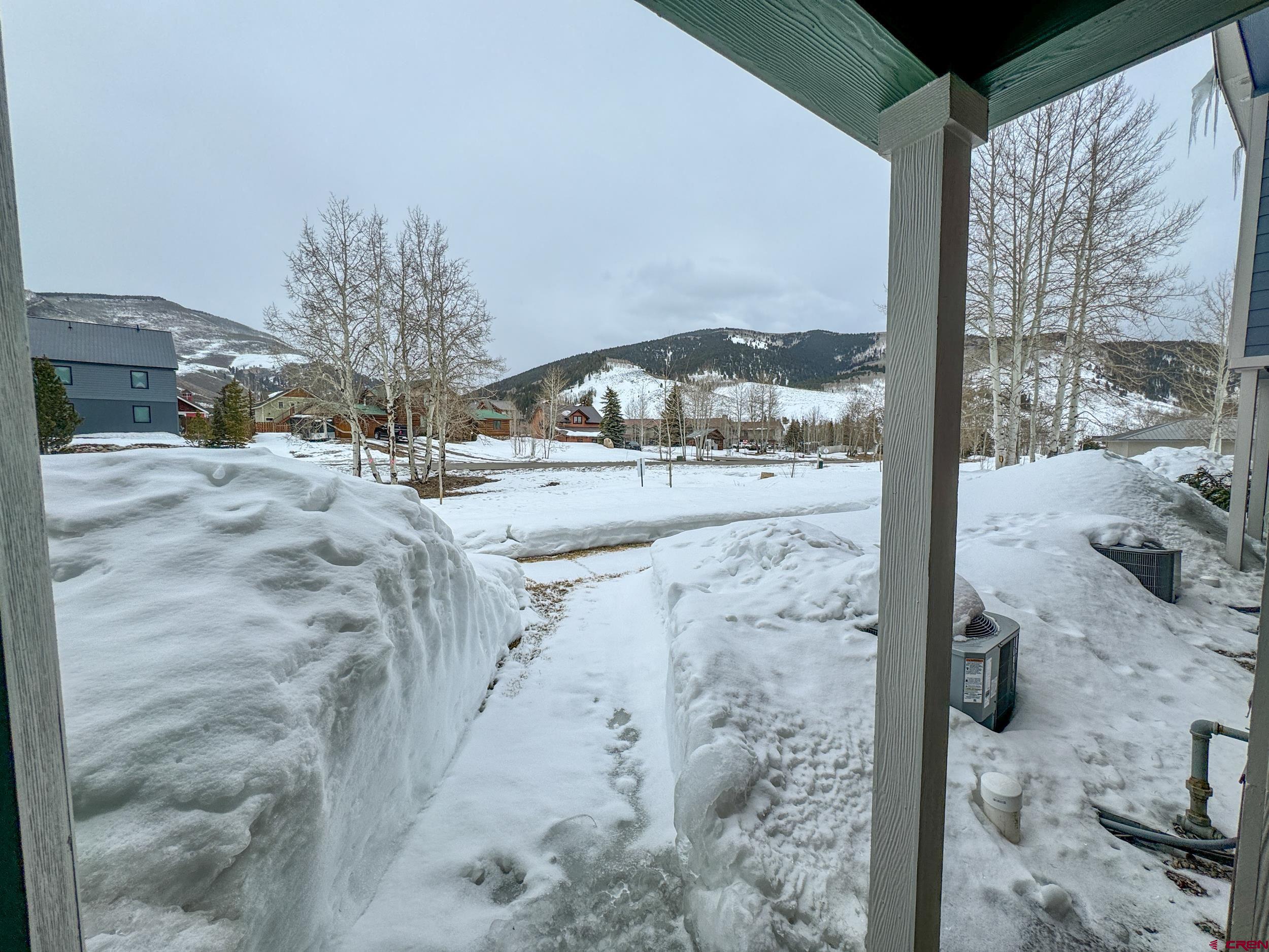 100 Teocalli Road, Unit 2 Crested Butte, CO 81224 - Photo 27 of 37 a view of a hall way with the trees