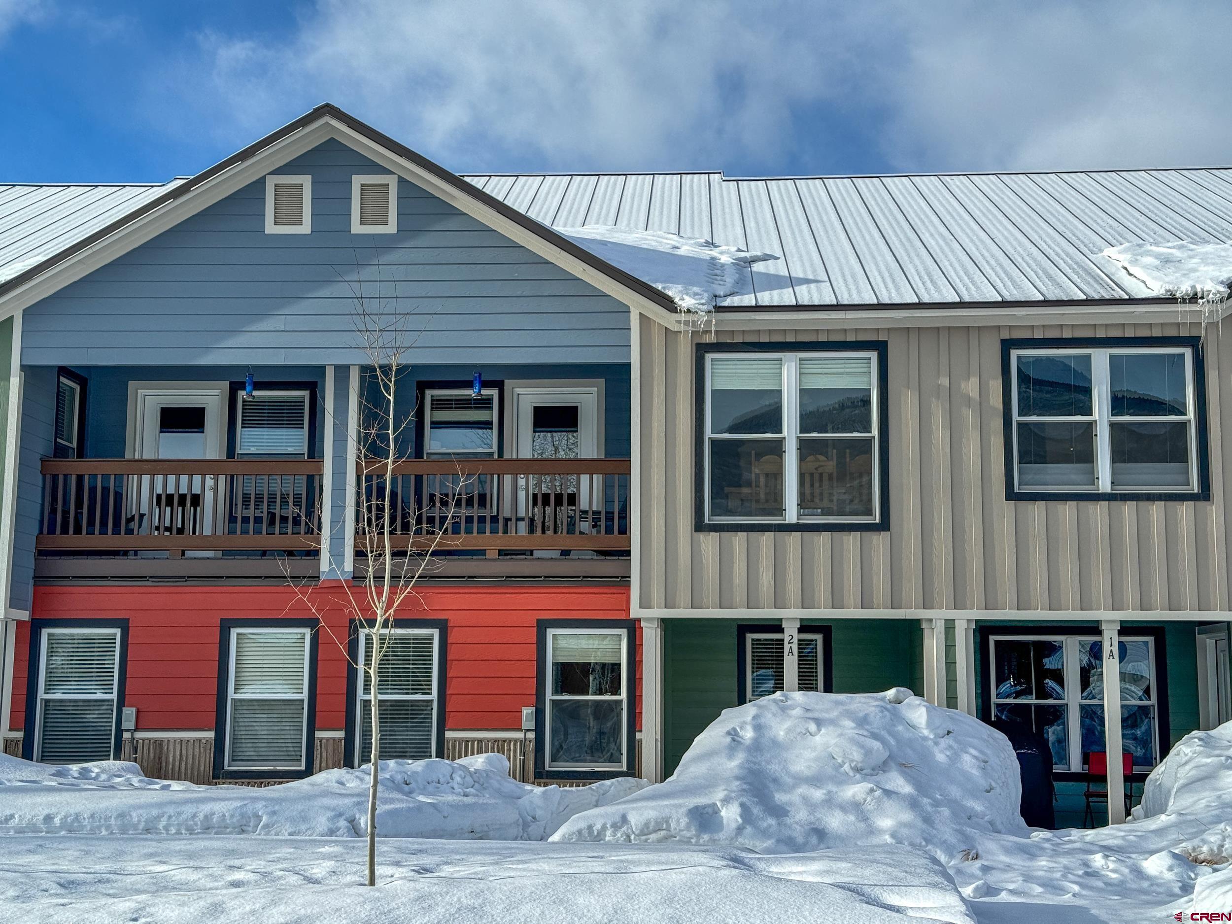 100 Teocalli Road, Unit 2 Crested Butte, CO 81224 - Photo 34 of 37 a front view of a house with glass windows