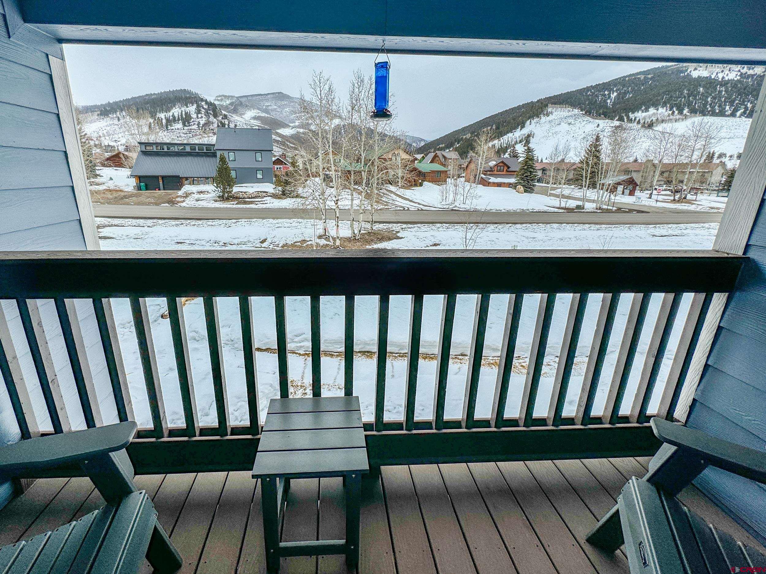 100 Teocalli Road, Unit 2 Crested Butte, CO 81224 - Photo 10 of 37 a view of a balcony wooden floor