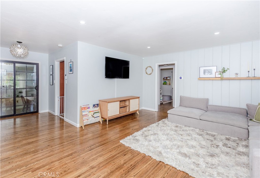 7734 Sycamore Avenue Riverside, CA 92504 - Photo 11 of 47 a living room with furniture and a flat screen tv