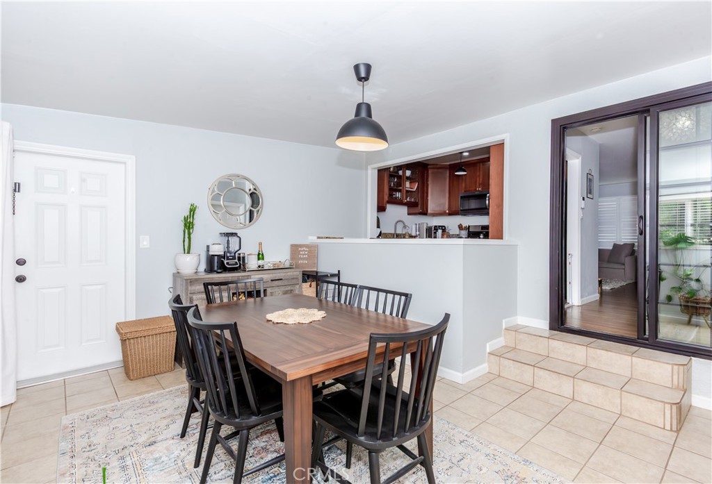 7734 Sycamore Avenue Riverside, CA 92504 - Photo 23 of 47 a view of a dining room with furniture