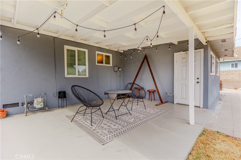 7734 Sycamore Avenue Riverside, CA 92504 - Photo 35 of 47 a view of a livingroom with furniture and a window