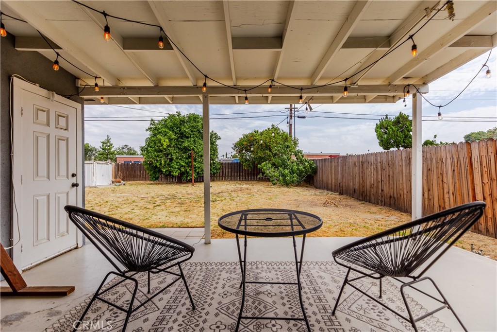 7734 Sycamore Avenue Riverside, CA 92504 - Photo 37 of 47 a view of a chairs and table in patio