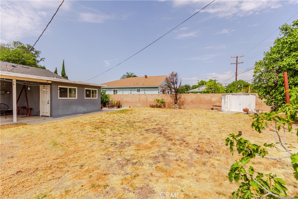 7734 Sycamore Avenue Riverside, CA 92504 - Photo 40 of 47 a bathroom with a sink and mirror