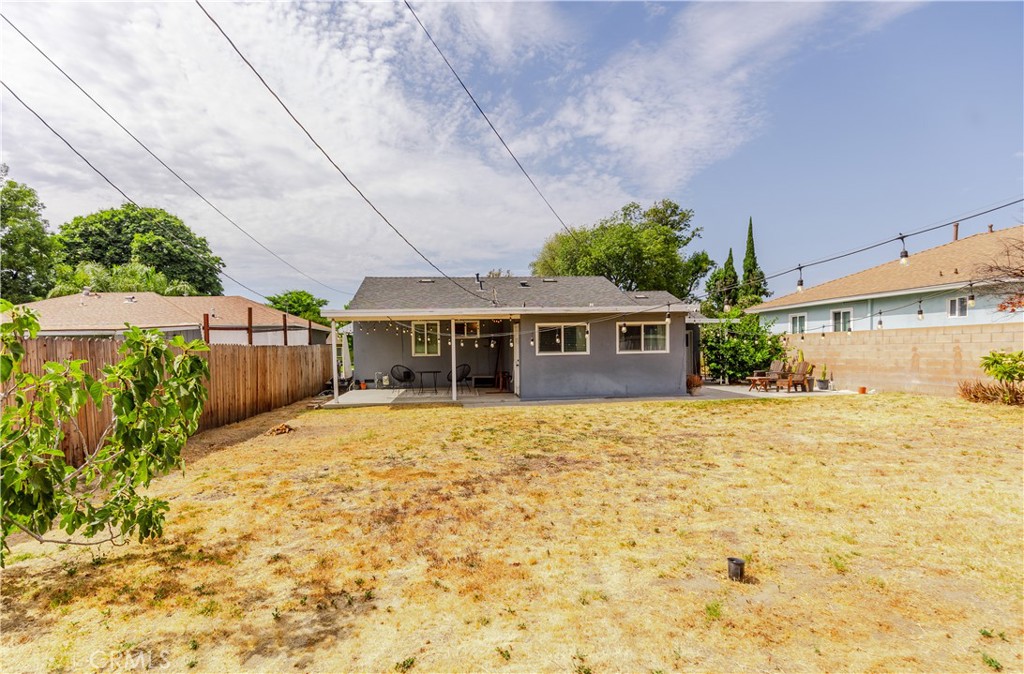 7734 Sycamore Avenue Riverside, CA 92504 - Photo 41 of 47 a front view of a house with a yard