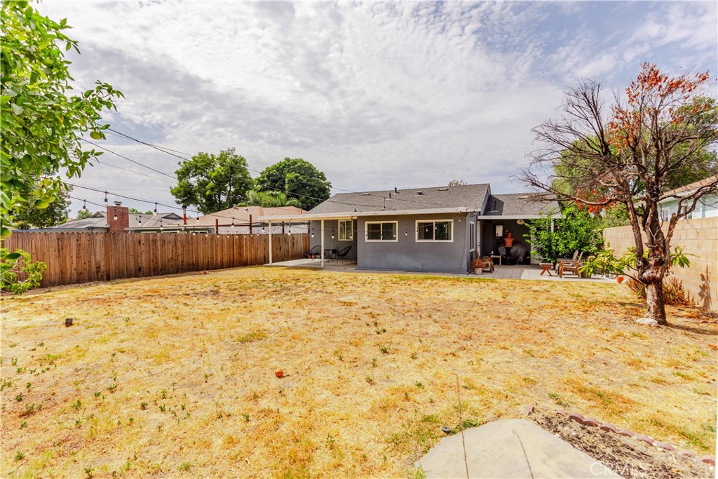 7734 Sycamore Avenue Riverside, CA 92504 - Photo 43 of 47 a front view of a house with a yard