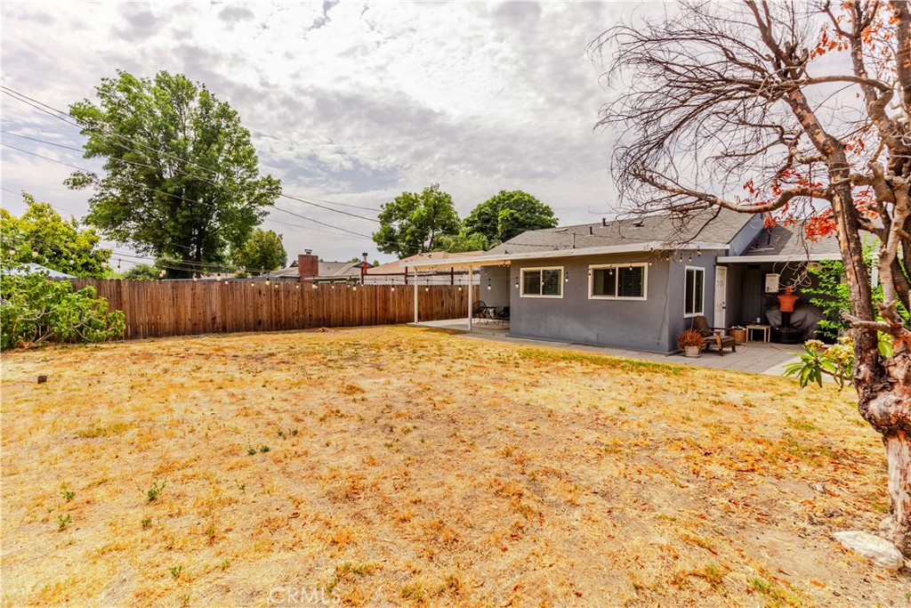 7734 Sycamore Avenue Riverside, CA 92504 - Photo 44 of 47 a front view of a house with a yard