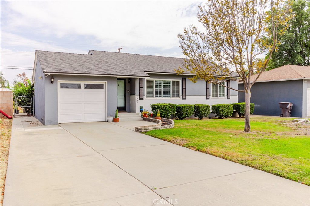 7734 Sycamore Avenue Riverside, CA 92504 - Photo 5 of 47 a house view with swimming pool in front of it