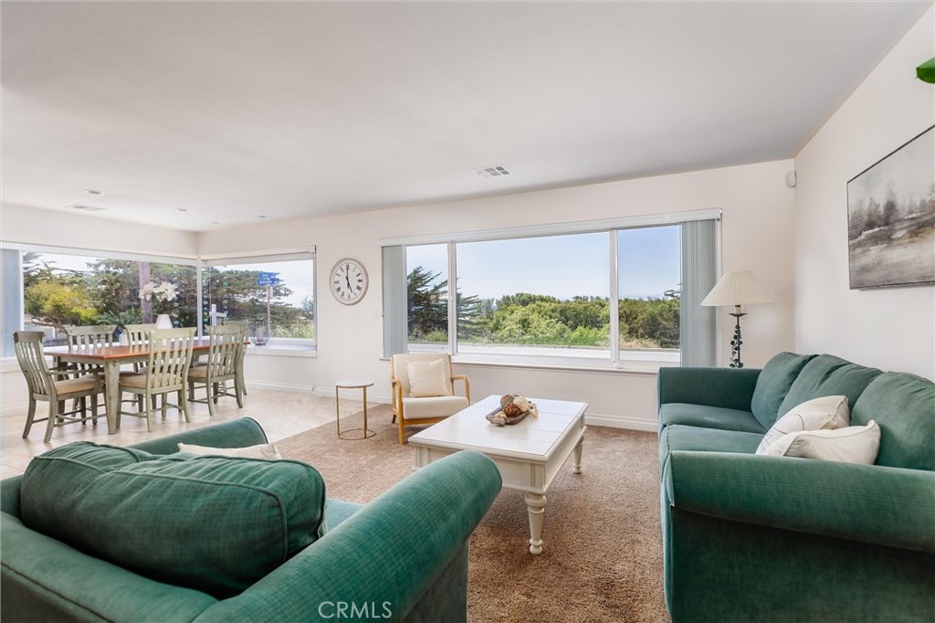 101 Java Street Morro Bay, CA 93442 - Photo 15 of 29 a living room with furniture and a large window