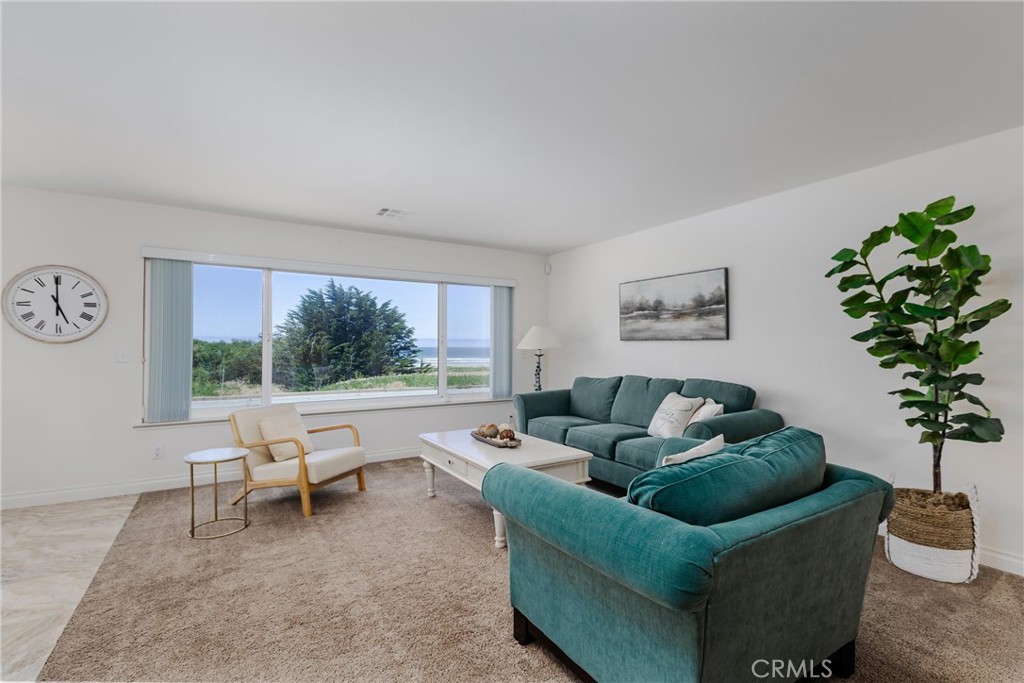 101 Java Street Morro Bay, CA 93442 - Photo 17 of 29 a living room with furniture and a large window