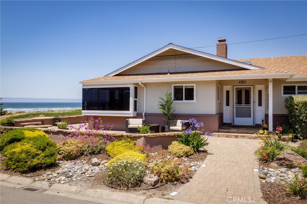 101 Java Street Morro Bay, CA 93442 - Photo 29 of 29 a front view of house with yard outdoor seating and entertaining space