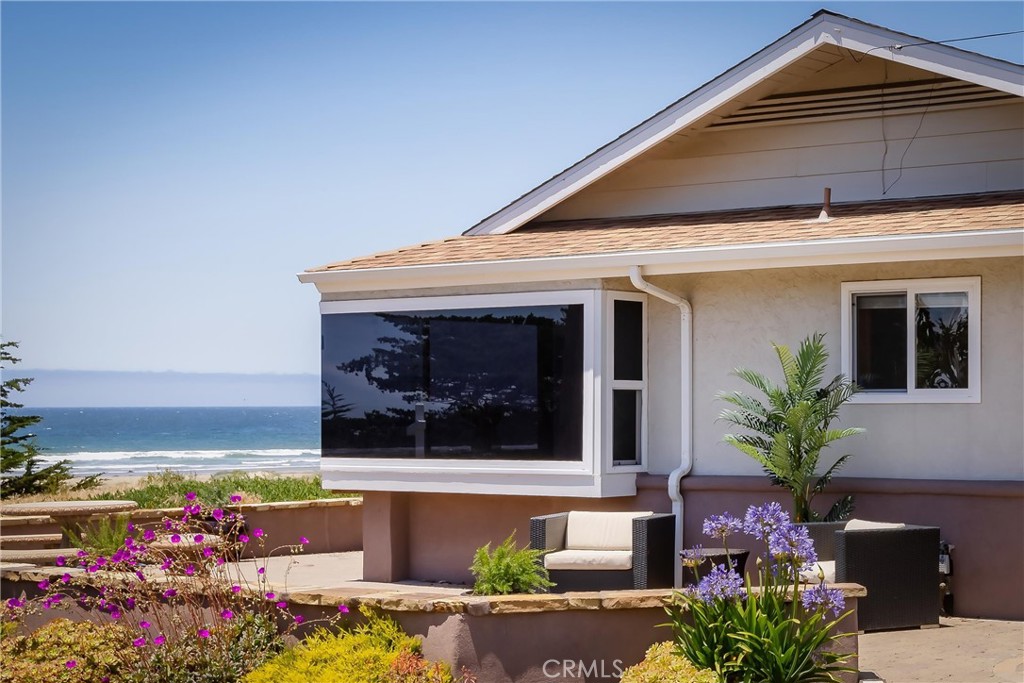 101 Java Street Morro Bay, CA 93442 - Photo 6 of 29 a front view of a house with a yard