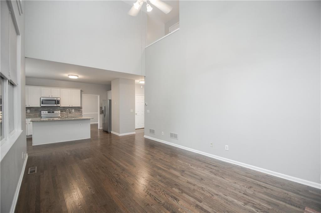 755 Sheridan Ridge Court Alpharetta, GA 30022 - Photo 19 of 57 a view of kitchen view wooden floor and kitchen