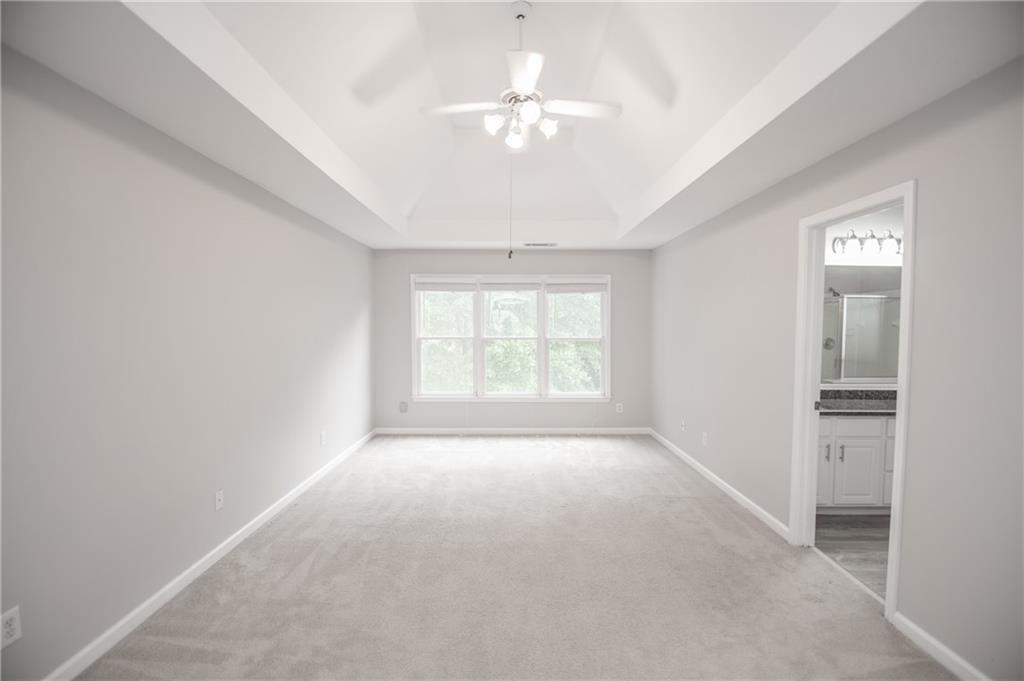 755 Sheridan Ridge Court Alpharetta, GA 30022 - Photo 26 of 57 a view of an empty room with a window