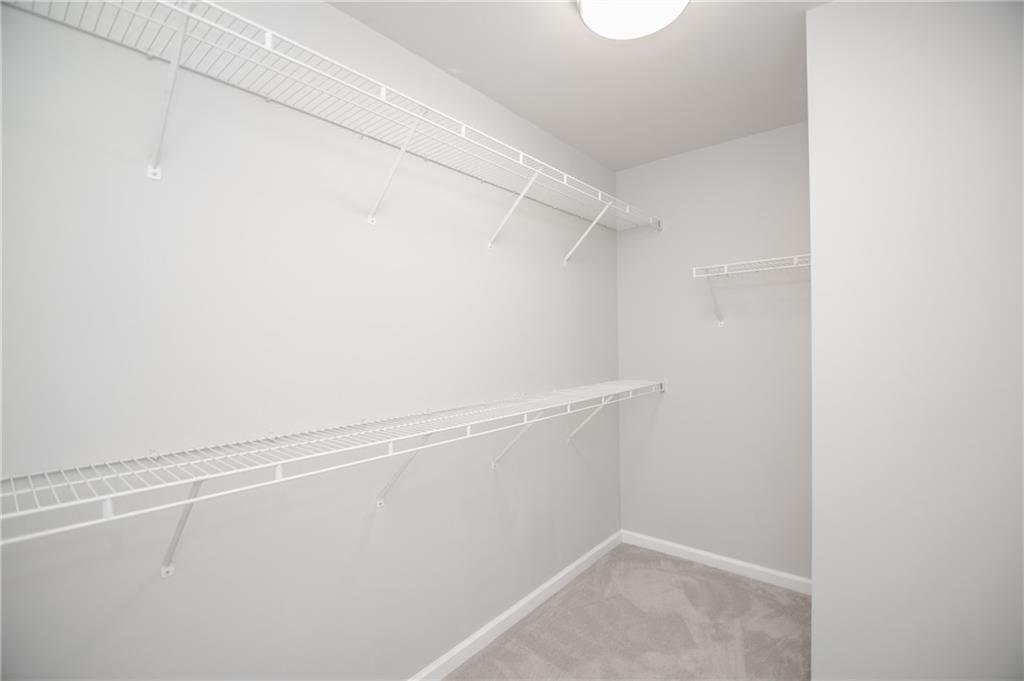 755 Sheridan Ridge Court Alpharetta, GA 30022 - Photo 30 of 57 a view of small space with racks on the wall