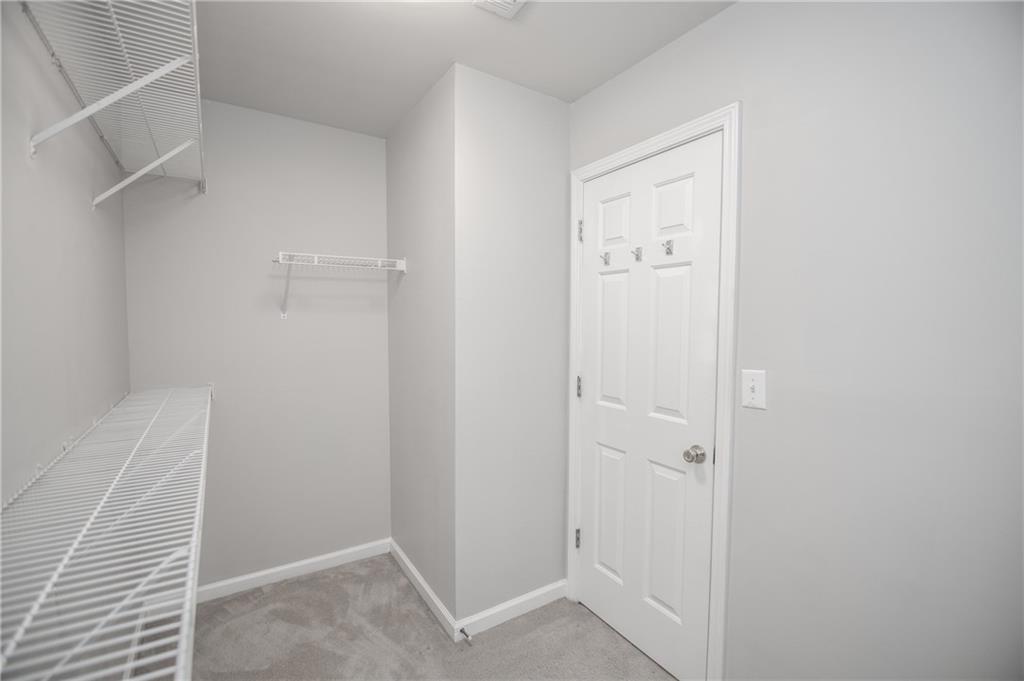 755 Sheridan Ridge Court Alpharetta, GA 30022 - Photo 31 of 57 a view of an empty room