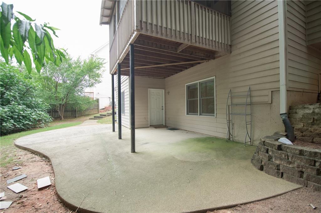 755 Sheridan Ridge Court Alpharetta, GA 30022 - Photo 49 of 57 a view of a house with backyard