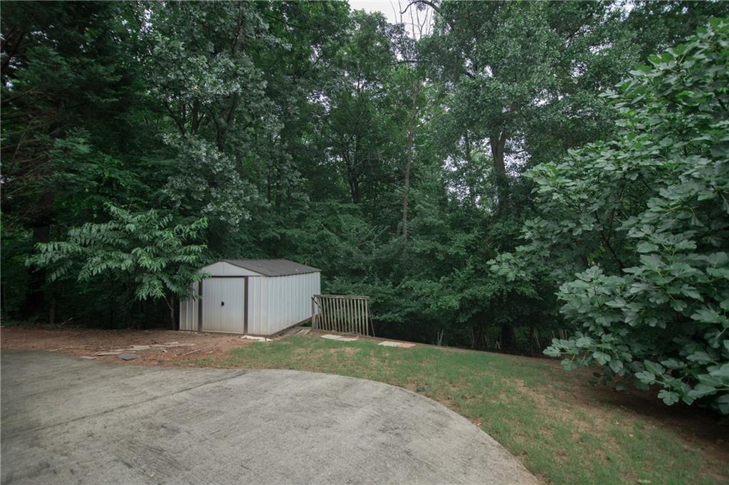 755 Sheridan Ridge Court Alpharetta, GA 30022 - Photo 50 of 57 a house view with a outdoor space