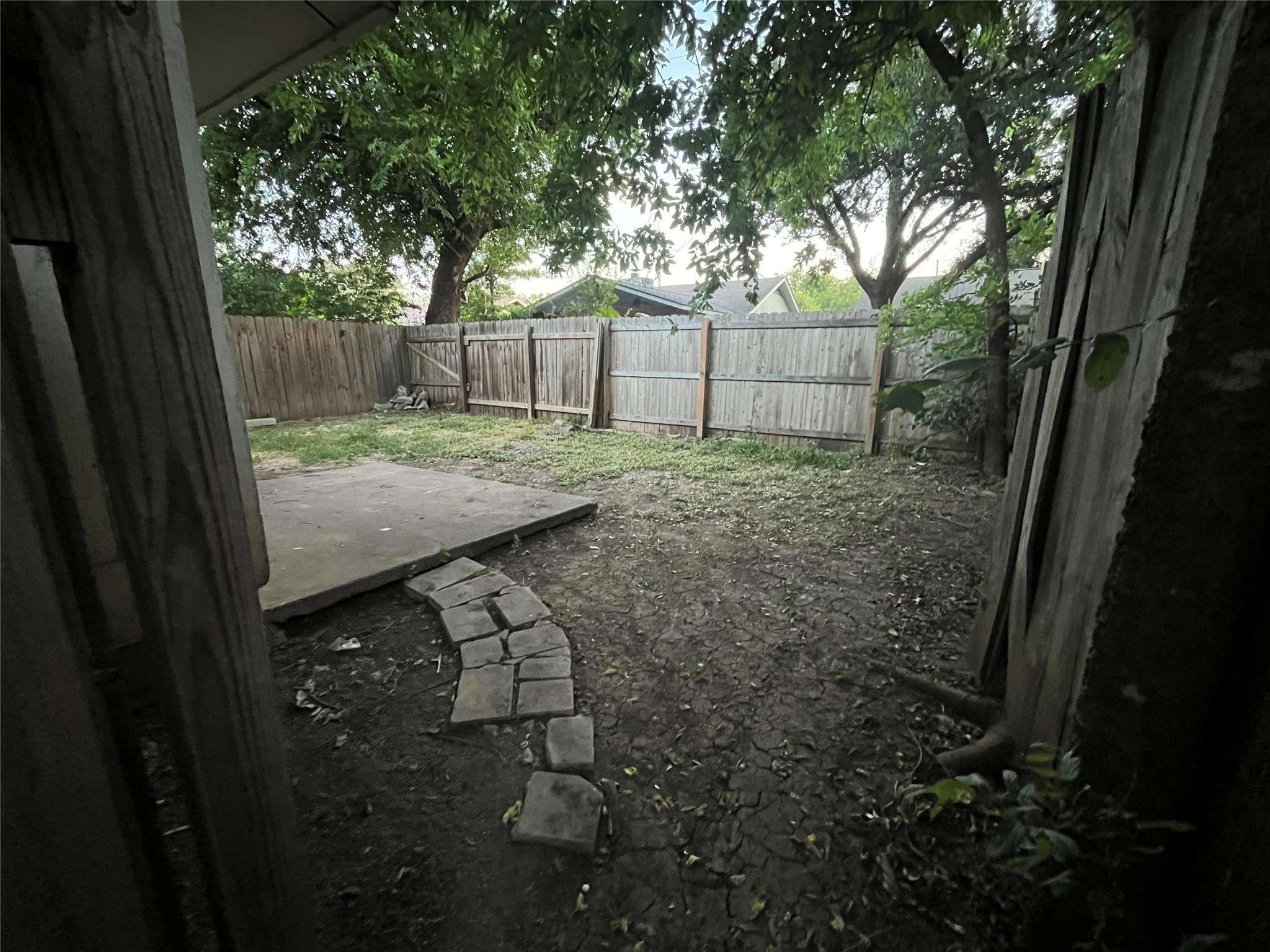 4702 Rocking Chair Road Austin, TX 78744 - Photo 20 of 28 Fenced backyard featuring a patio