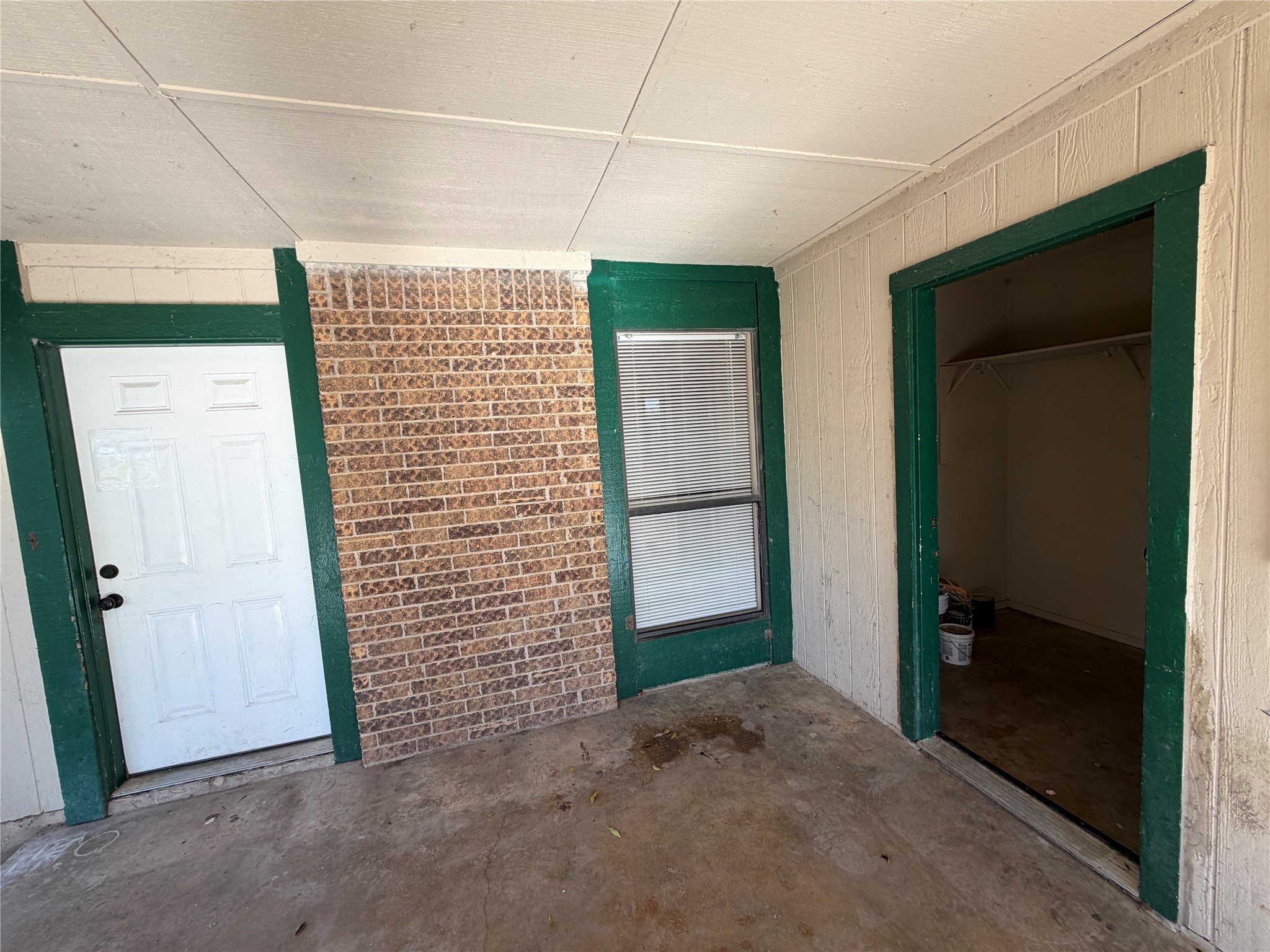 4702 Rocking Chair Road Austin, TX 78744 - Photo 3 of 28 Doorway to property featuring a patio area and brick siding