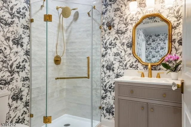 a bathroom with a sink and mirror