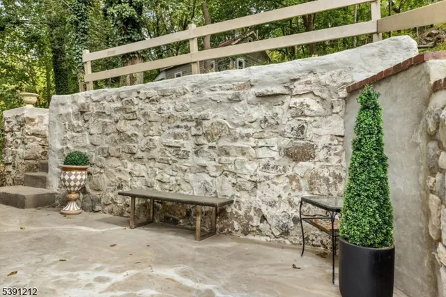 a buildings with trees in front of it