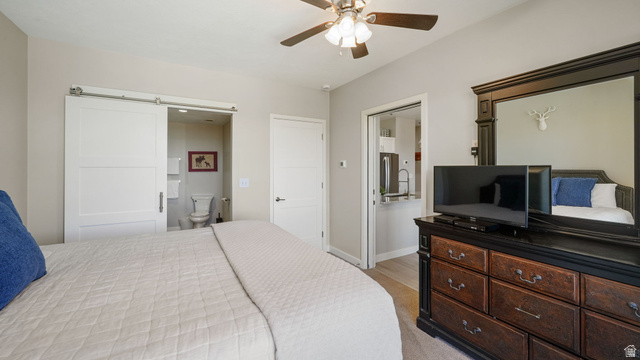 1364 Still Water Drive, Unit R2012 Heber City, UT 84032 - Photo 18 of 30 Room featuring neutral wall tones, a ceiling fan with integrated lighting, and carpeted flooring