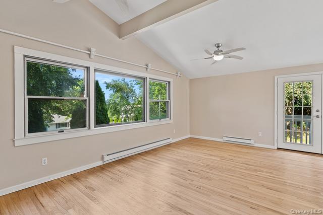 10 Brooker Drive Newburgh, NY 12550 - Photo 3 of 33 a view of an empty room with wooden floor and a window