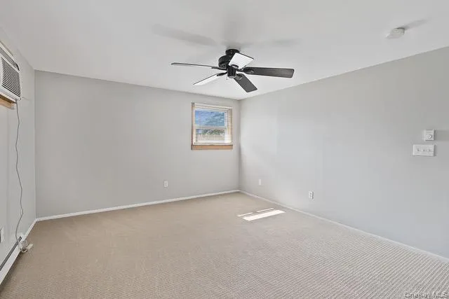 a bathroom with a toilet sink and tub