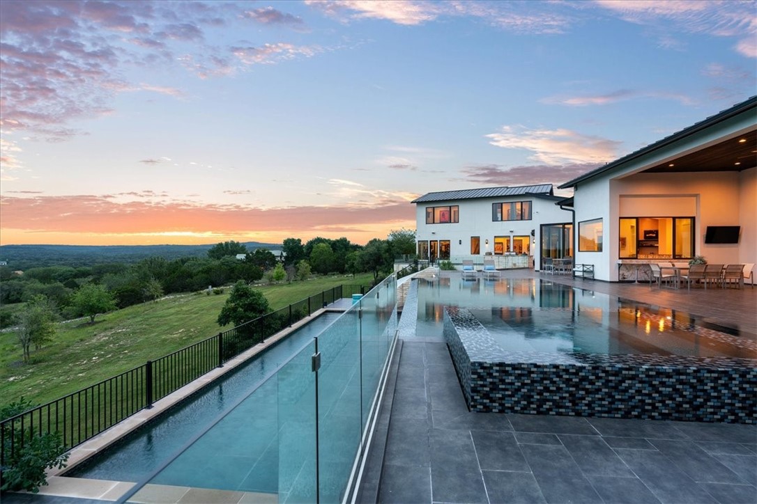 a view of swimming pool from a balcony