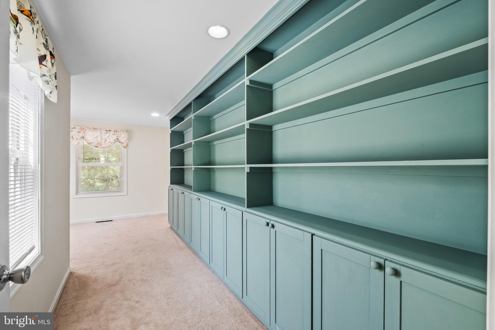 23116 Gilpin Point Road Preston, MD 21655 - Photo 11 of 66 Custom built-In shelving and cabinets in office.