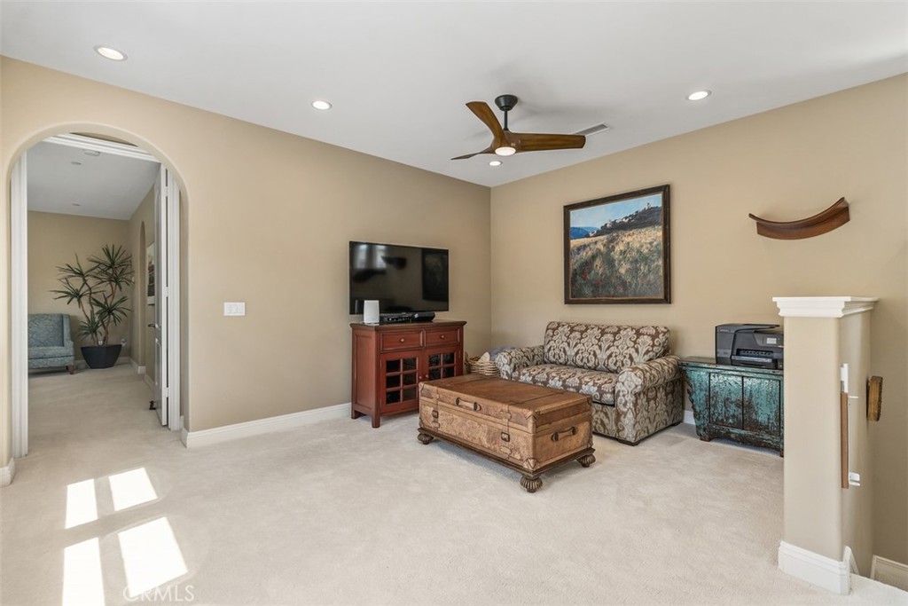 20 Old Mission Road Aliso Viejo, CA 92656 - Photo 15 of 35 a spacious bedroom with a bed and a flat screen television