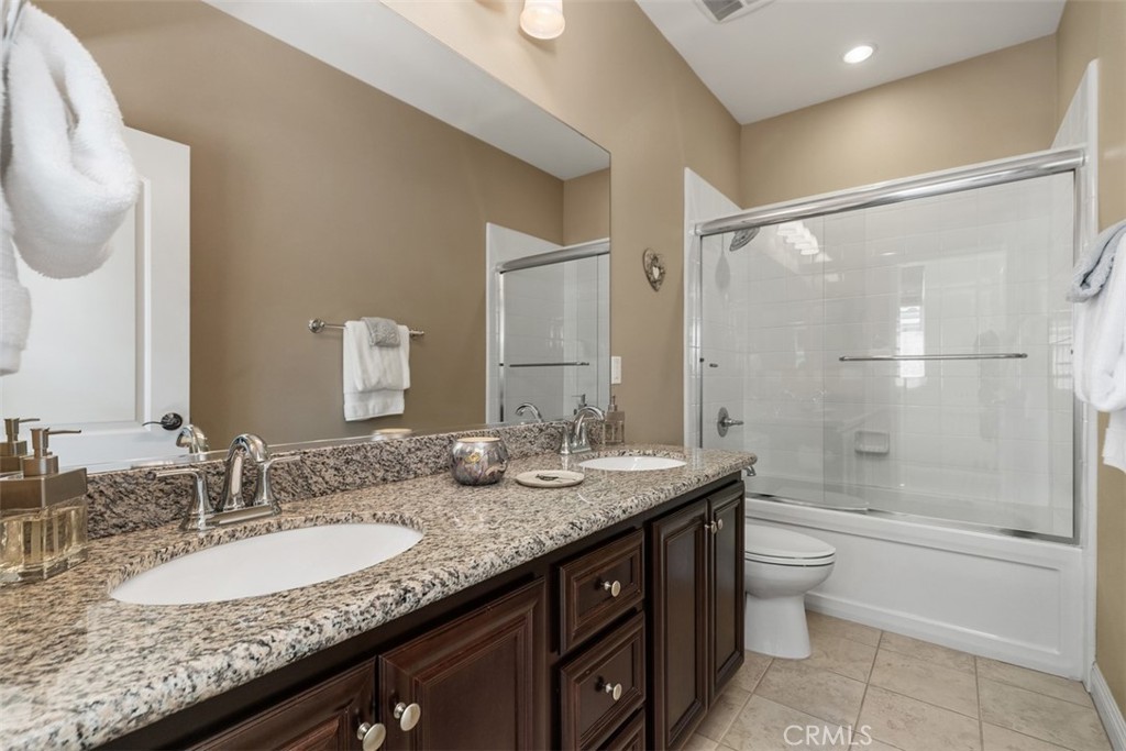 20 Old Mission Road Aliso Viejo, CA 92656 - Photo 23 of 35 a bathroom with a granite countertop sink mirror toilet and bathtub