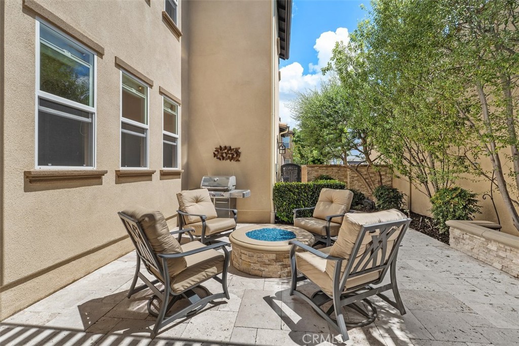 20 Old Mission Road Aliso Viejo, CA 92656 - Photo 26 of 35 a view of a patio with table and chairs and potted plants