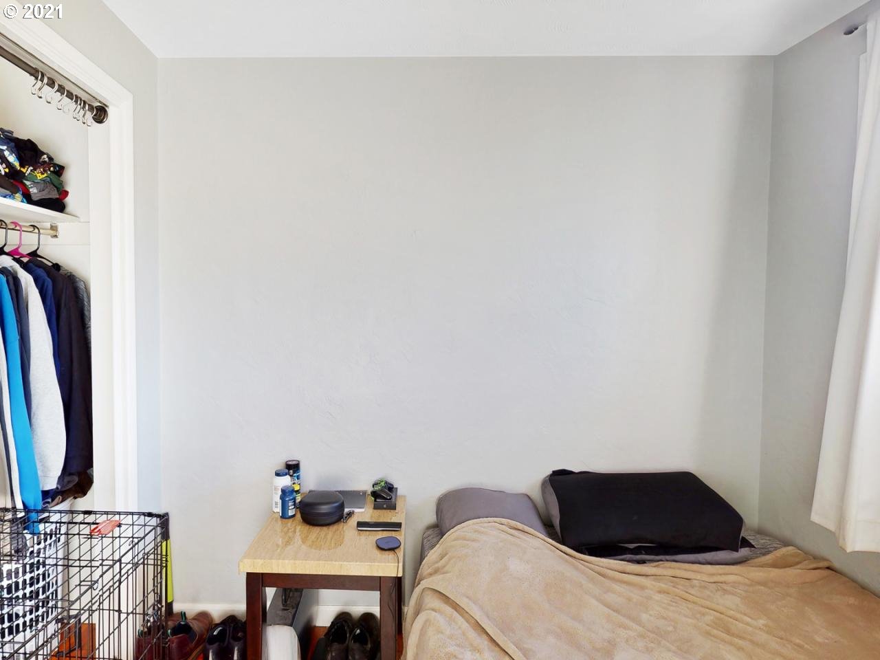 3440 C Street Springfield, OR 97478 - Photo 14 of 21 a bedroom with a bed and a chair