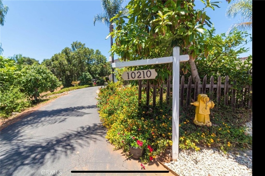10210 Lilac Ridge Road Escondido, CA 92026 - Photo 13 of 26 a sign that is on the side of the road