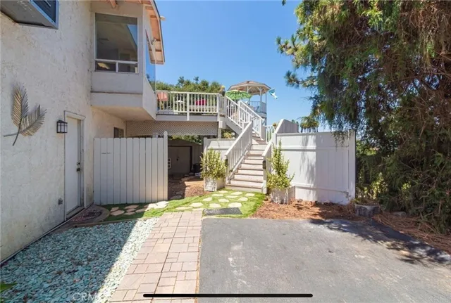 a kitchen with kitchen island a large counter top space and stainless steel appliances