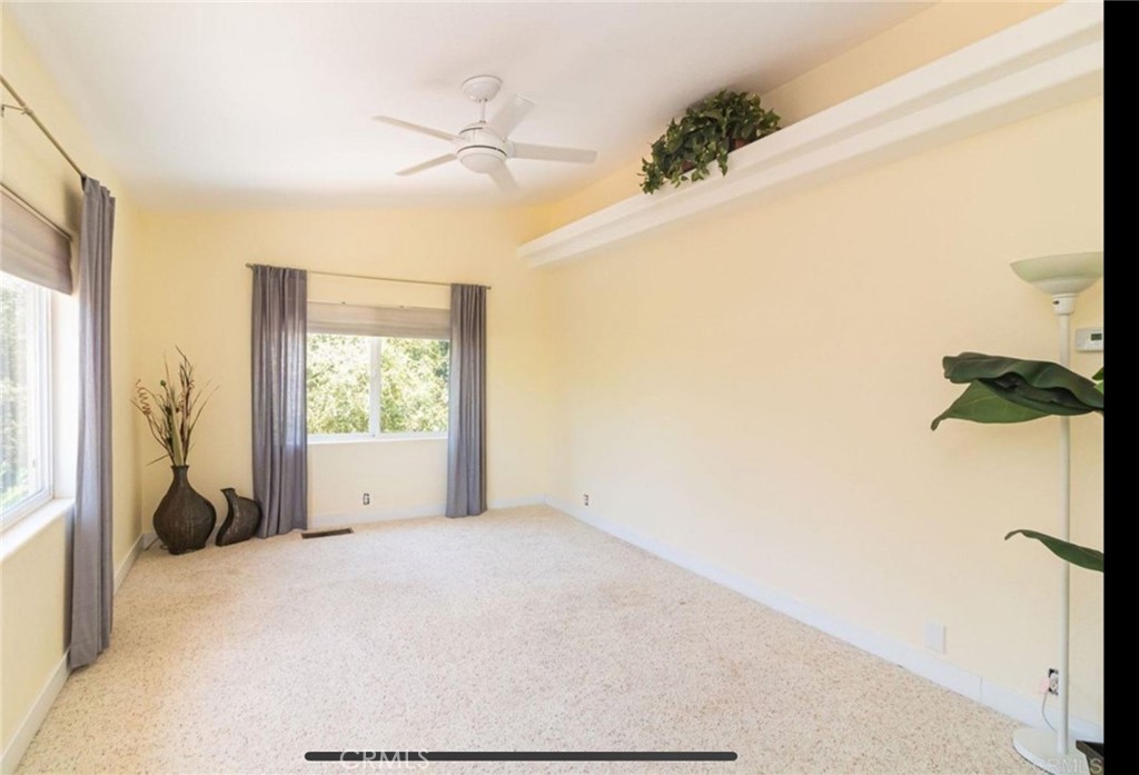 10210 Lilac Ridge Road Escondido, CA 92026 - Photo 17 of 26 a view of an empty room and a window