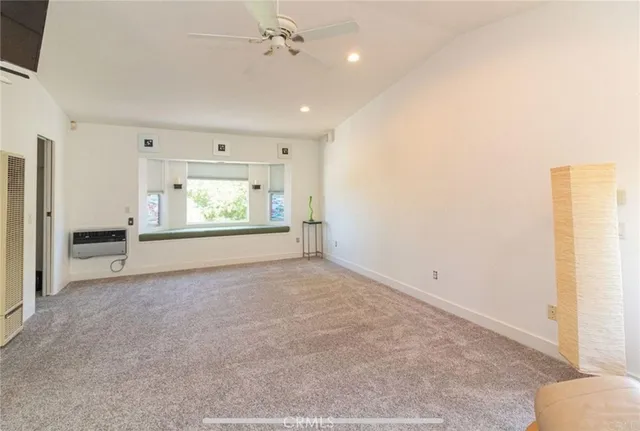 a living room with a fireplace