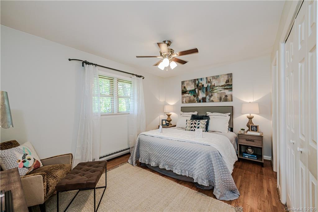 441 Scaleybark Road Charlotte, NC 28209 - Photo 15 of 24 a bedroom with a bed and a window