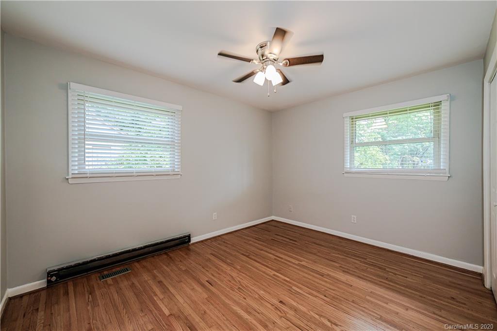 441 Scaleybark Road Charlotte, NC 28209 - Photo 18 of 24 a view of a room with wooden floor and windows