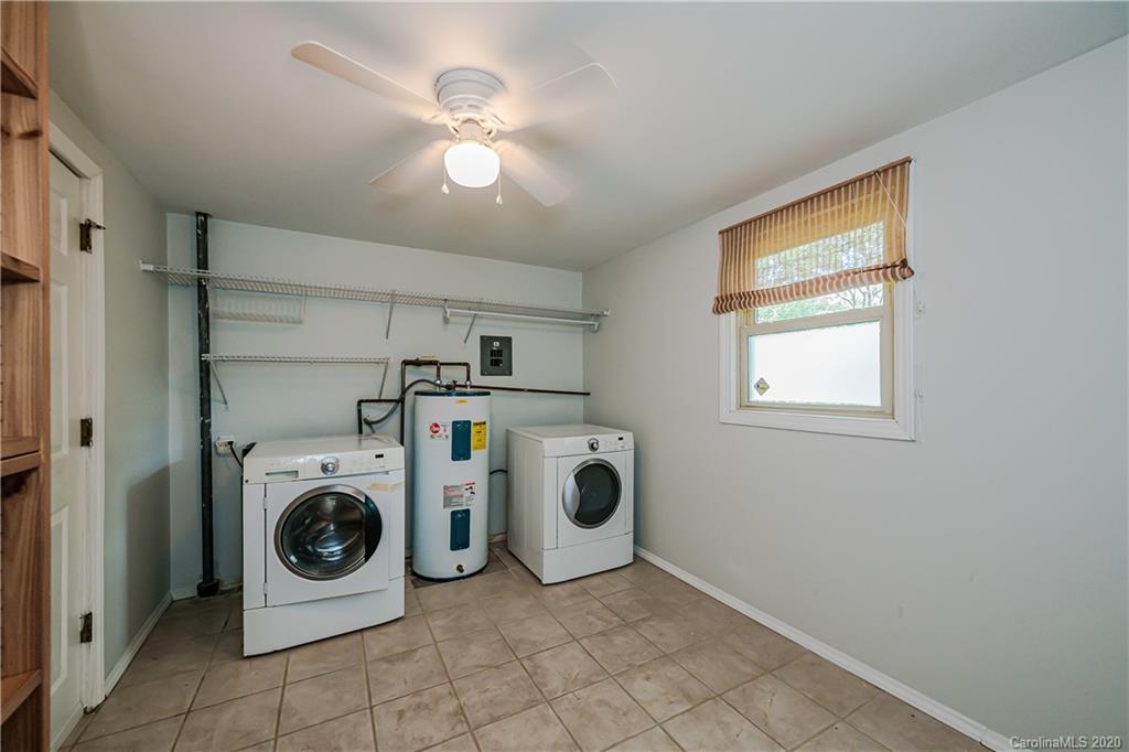 441 Scaleybark Road Charlotte, NC 28209 - Photo 19 of 24 a utility room with dryer and washer