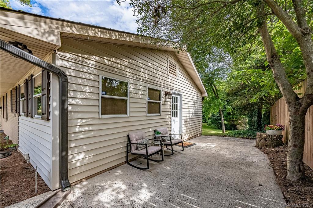 441 Scaleybark Road Charlotte, NC 28209 - Photo 20 of 24 a view of a house with a yard and furniture
