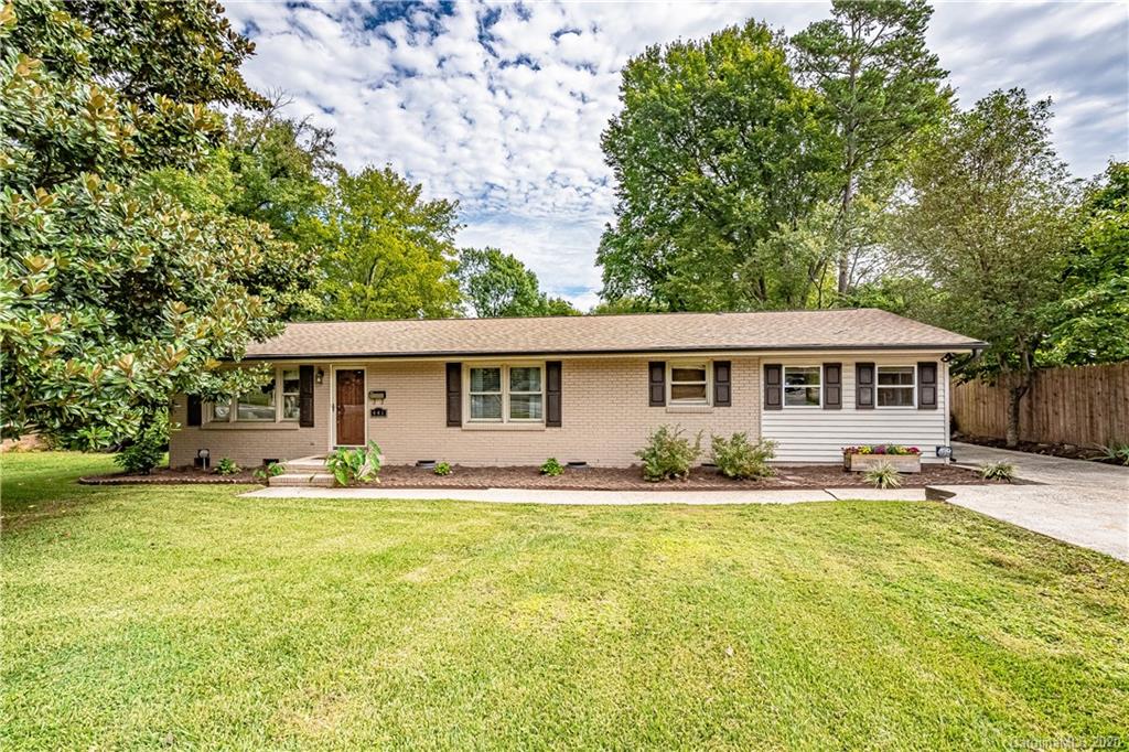 441 Scaleybark Road Charlotte, NC 28209 - Photo 24 of 24 a front view of a house with a yard