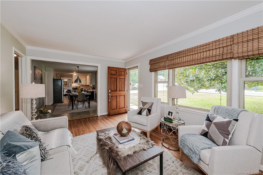 441 Scaleybark Road Charlotte, NC 28209 - Photo 5 of 24 a living room with furniture and a large window