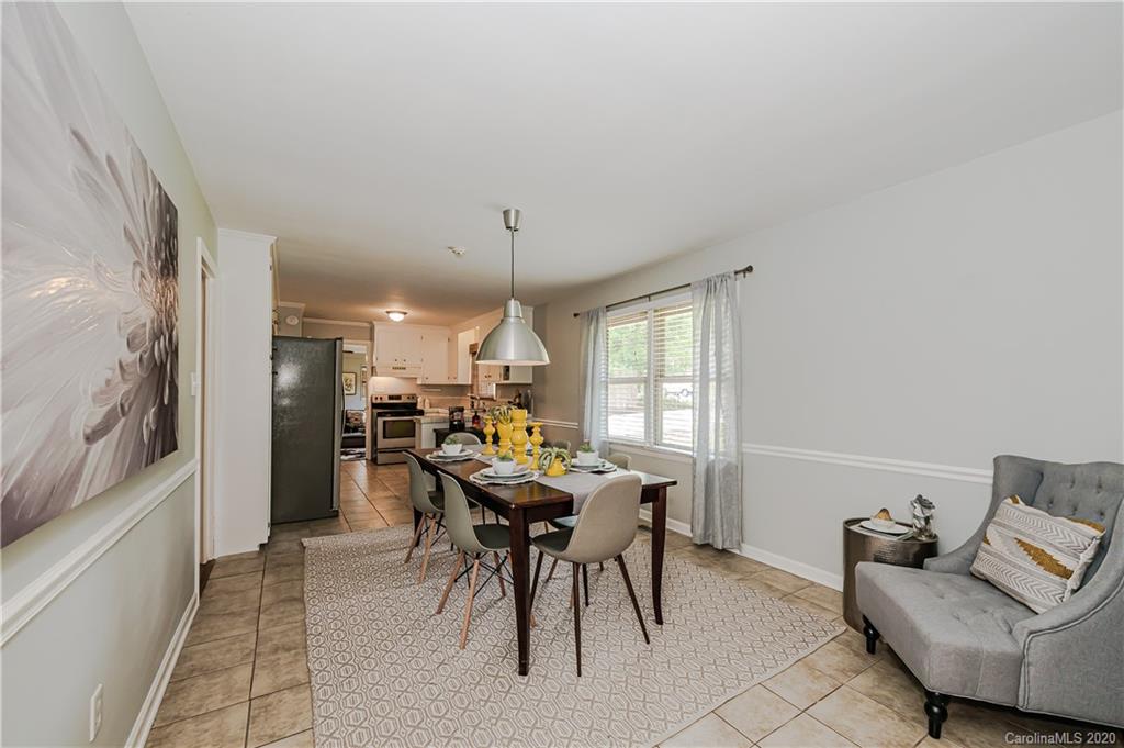 441 Scaleybark Road Charlotte, NC 28209 - Photo 6 of 24 a view of a dining room with furniture