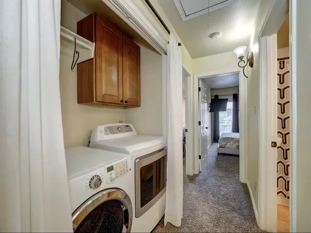 a view of a balcony with chair and wooden floor